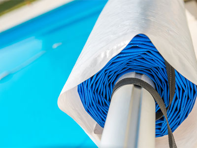 lower swimming pool heating costs